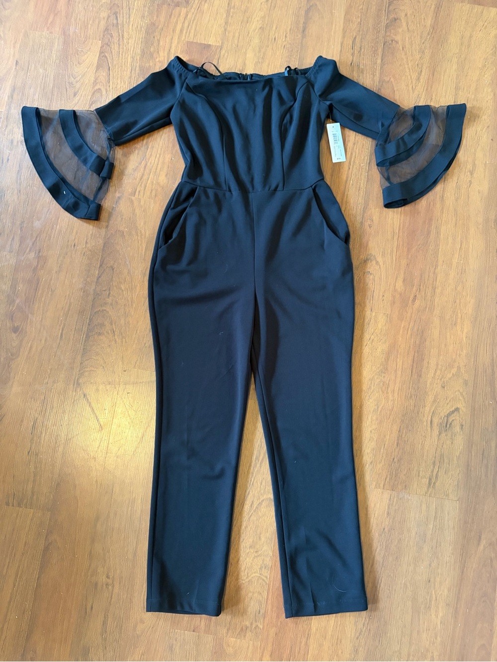 Premier Amour Black Off-Shoulder Jumpsuit with Sheer Bell Sleeves